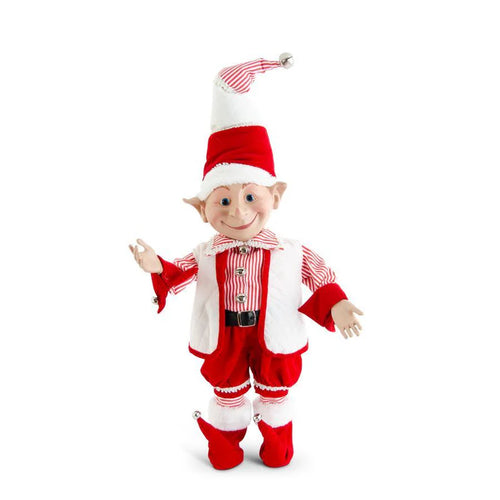 Elf doll in red and white outfit with striped hat on a white background