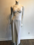 1960s vintage peek a boo dress cream rayon with crisscross cut outs 