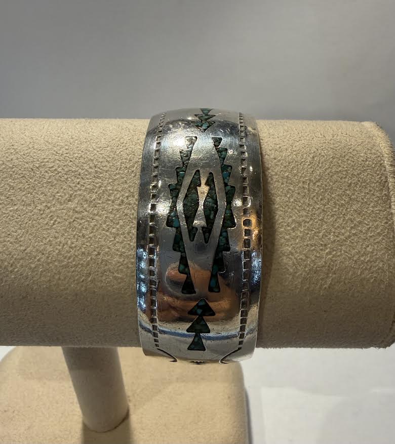 A sterling silver cuff bracelet with  Turquoise 