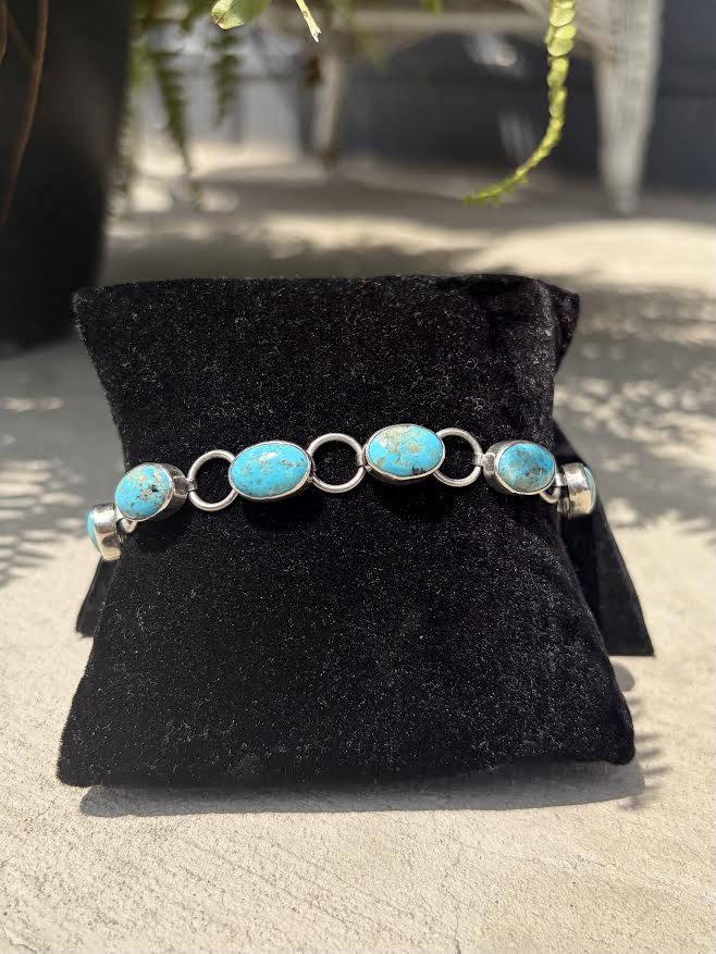  oval turquoise stones with Sterling silver