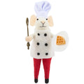 Toy mouse dressed as a chef holding a spoon and waffle