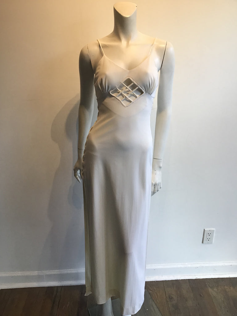 cream 1960s bond girl peek a boo cut out dress