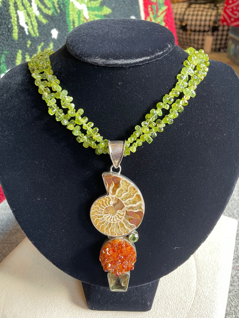 Multistrand Green Peridot , Citrine, nautilus fossill and and crystal necklace