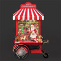 LIGHTED SWIRL TOYSHOP CART WITH SANTA & TOYS
