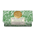 Bar of soap with green leafy design packaging and gold seal, featuring Michel Design Works branding.
