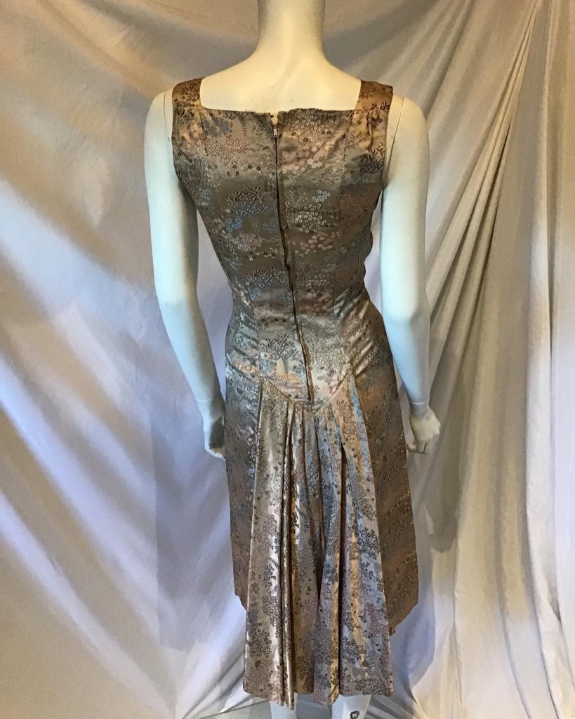 1950s Taupe silk brocade with Chinese motif Cocktail dress with  fishtail back