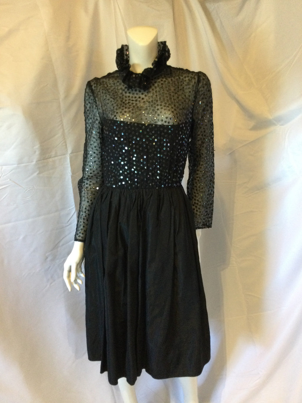 Vintage 1960s Bill Blass Black Silk seqinned Bodice dress with ruffled collar 