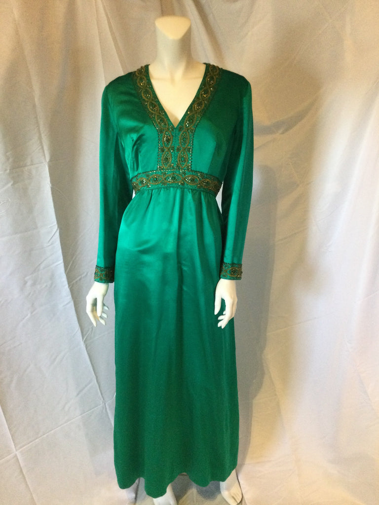 A vintage 1960's emerald green  silk satin evening gown 