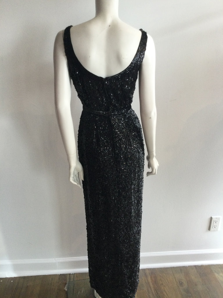 Black entirely sequinned 1960s long black evening dress. made in Hong Kong .Mint condition. Perfect for chaneling your inner MARILYN MONROE OR AUDREY HEPBURN 