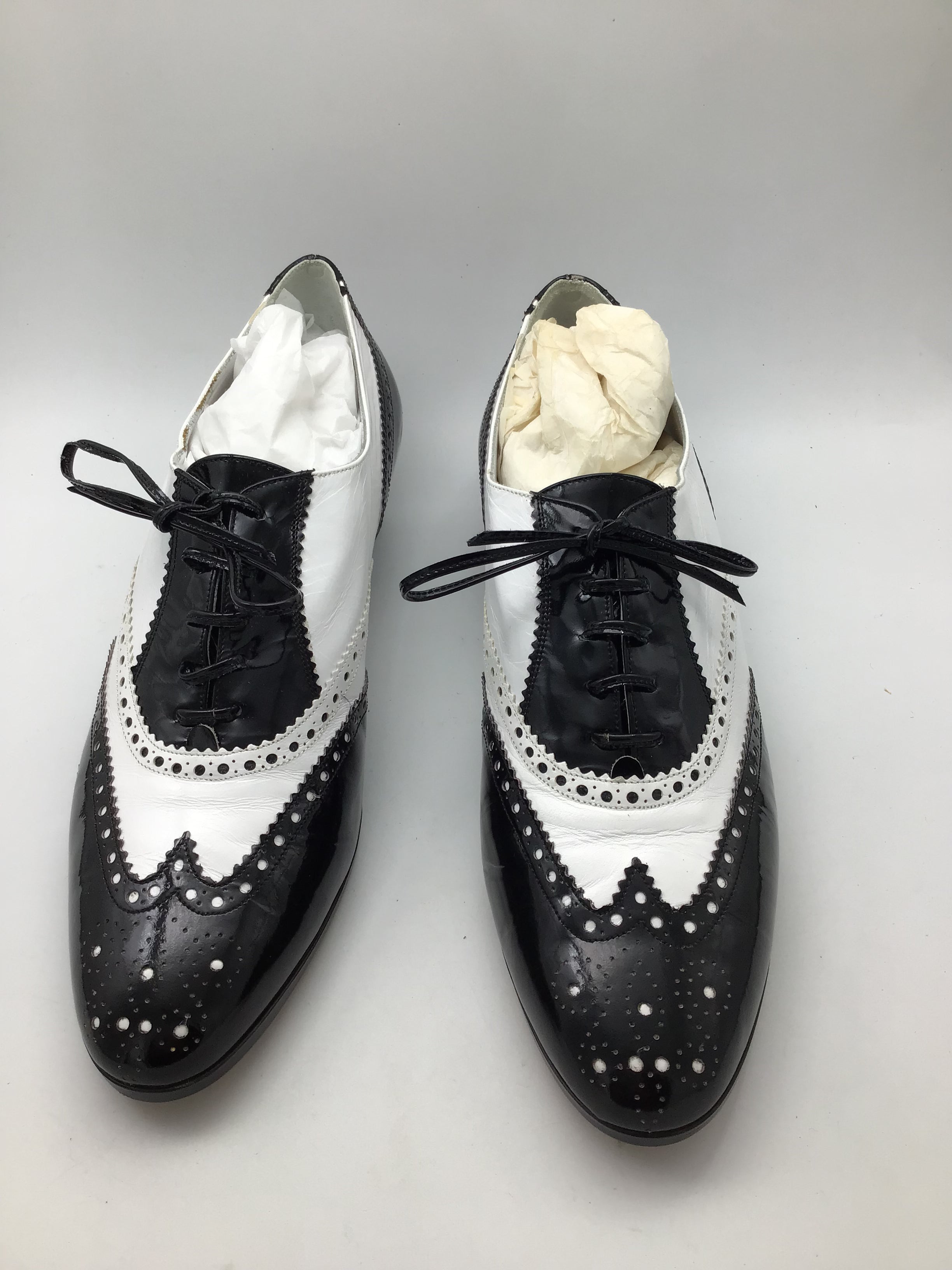 Vintage 1950s Black and White Wingtip Shoes and Red Pumps